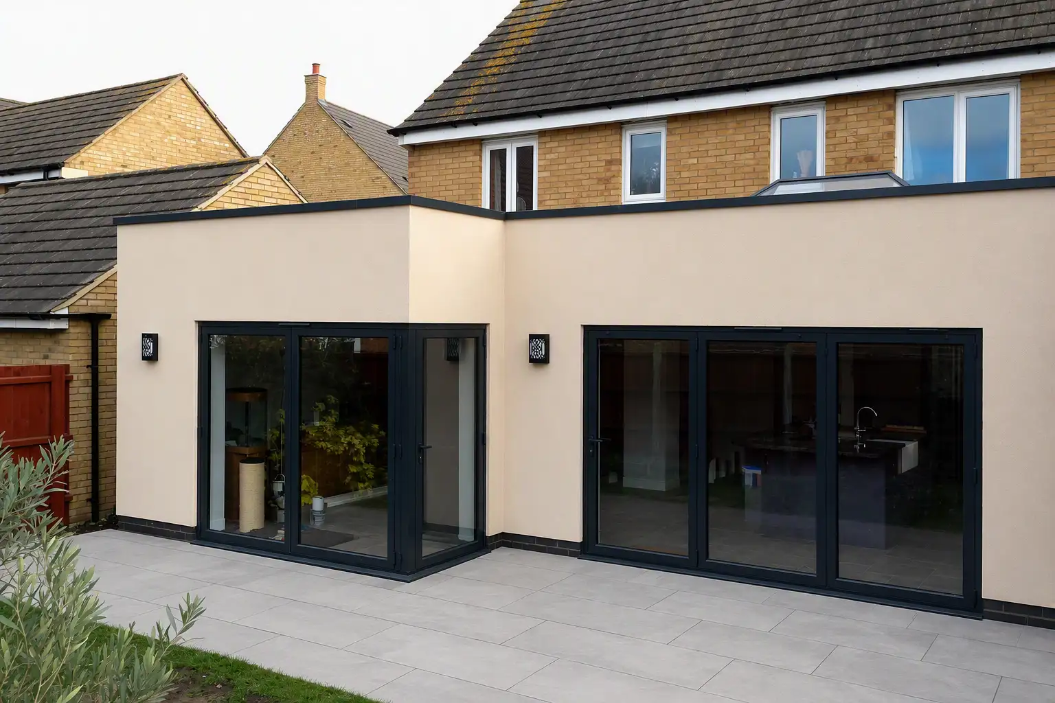 Rendered rear extension with twin bi-fold doors